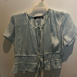 Blue patterned blouse top